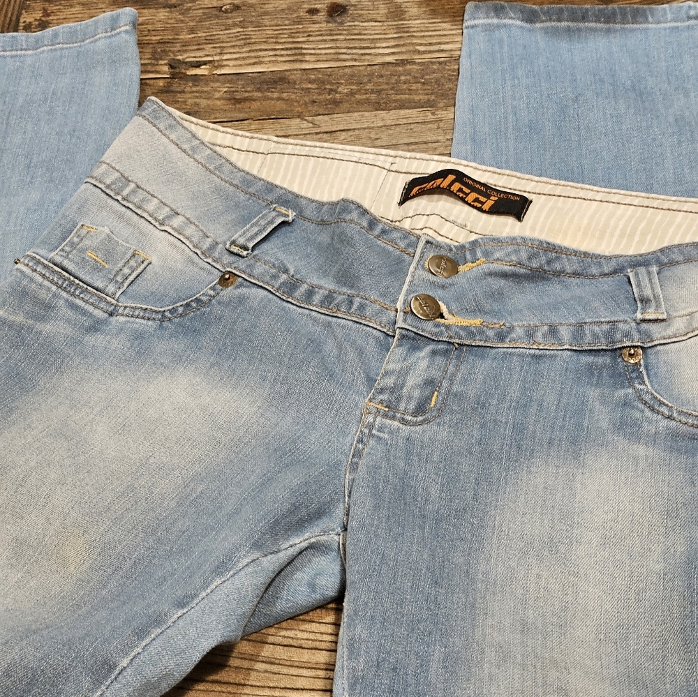 16inch waist 42 inches long sized 44 equals 6 USA unique jeans